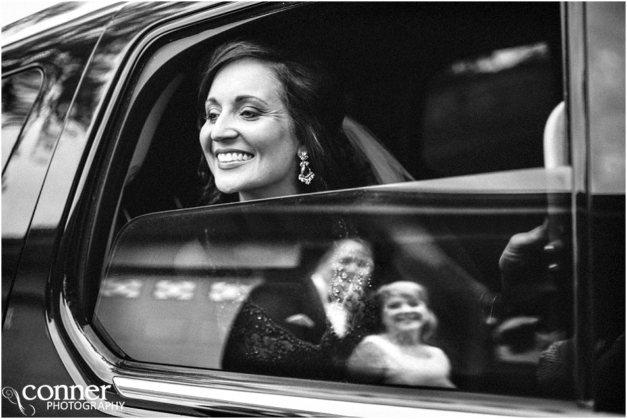 cool bride in limo with parents