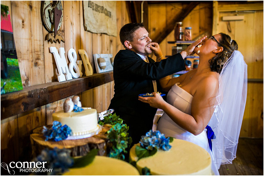 barn wedding reception cake smash