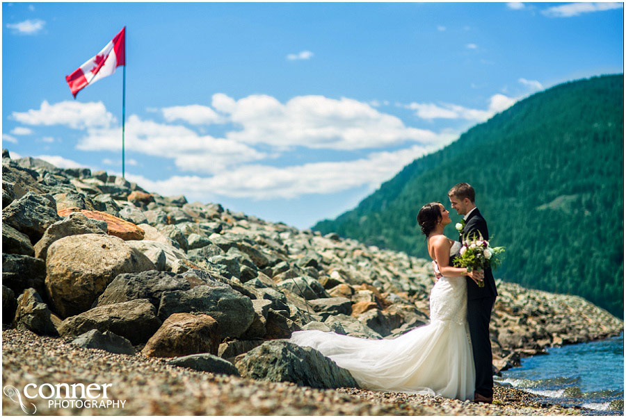 harrison lake bride and groom wedding Canadian flag