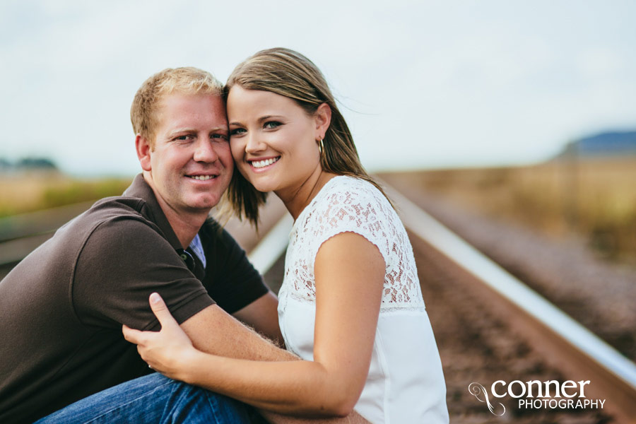 Fall Country Engagement on train tracks and barn