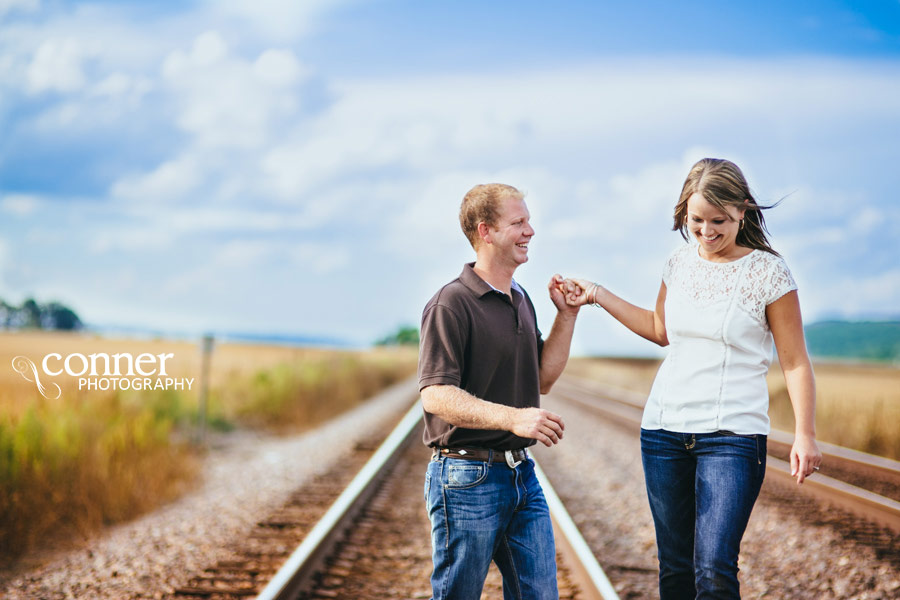 Fall Country Engagement on train tracks and barn