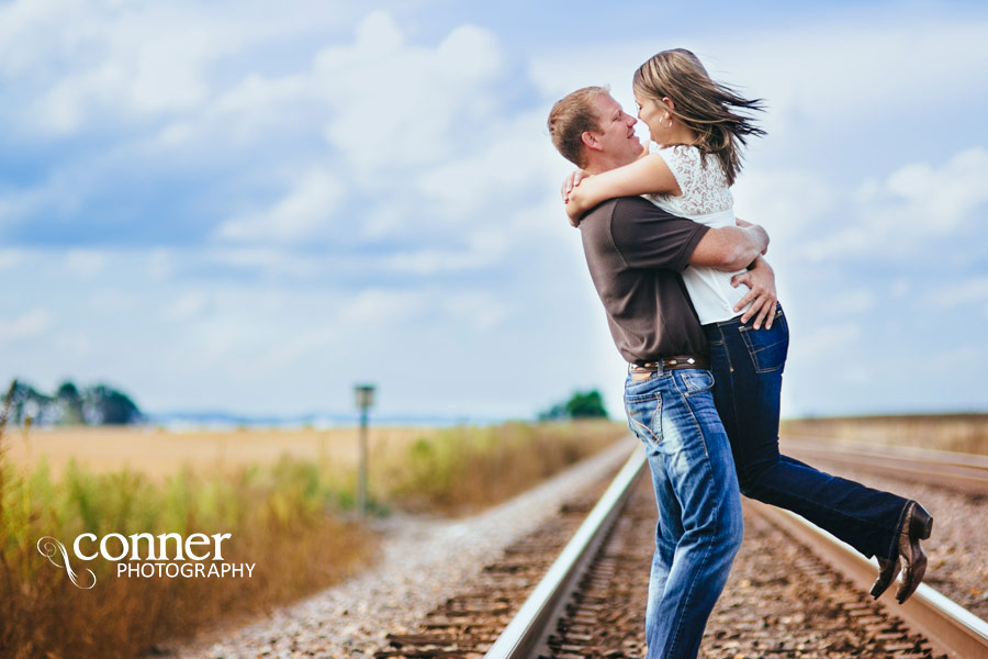 Fall Country Engagement on train tracks and barn