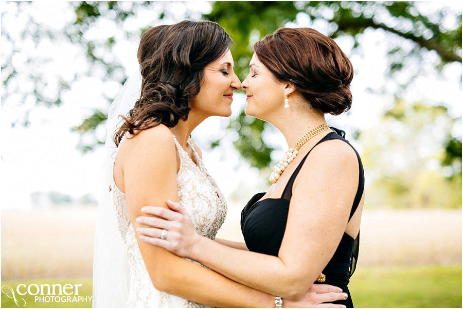 cute bride and sister Eskimo kisses