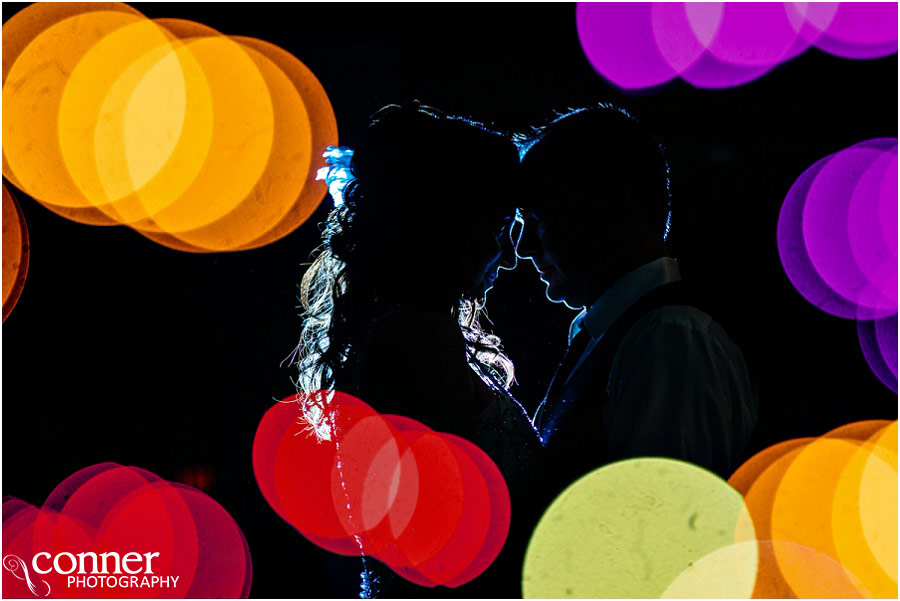 cool bride and groom night bokeh photo