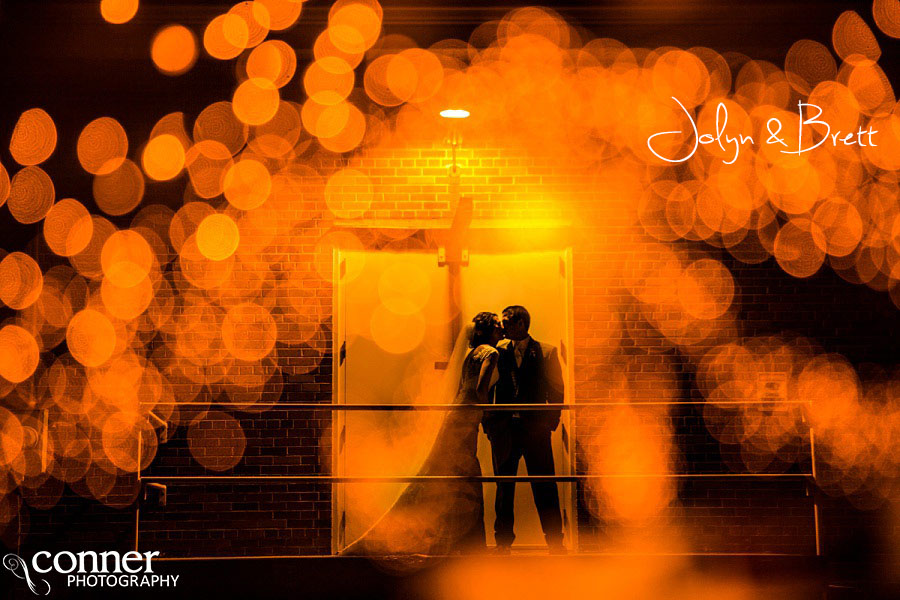 bride and groom artistic silhouette bokeh