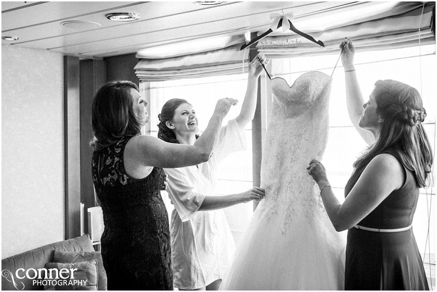 bride and mother and sister with dress