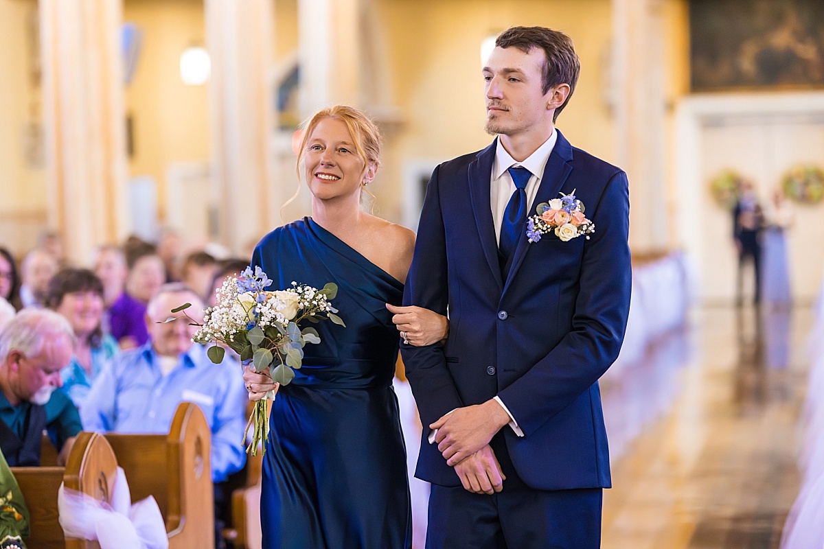 Alex is escorted down the aisle at Ste. Genevieve Catholic Church ny his mother