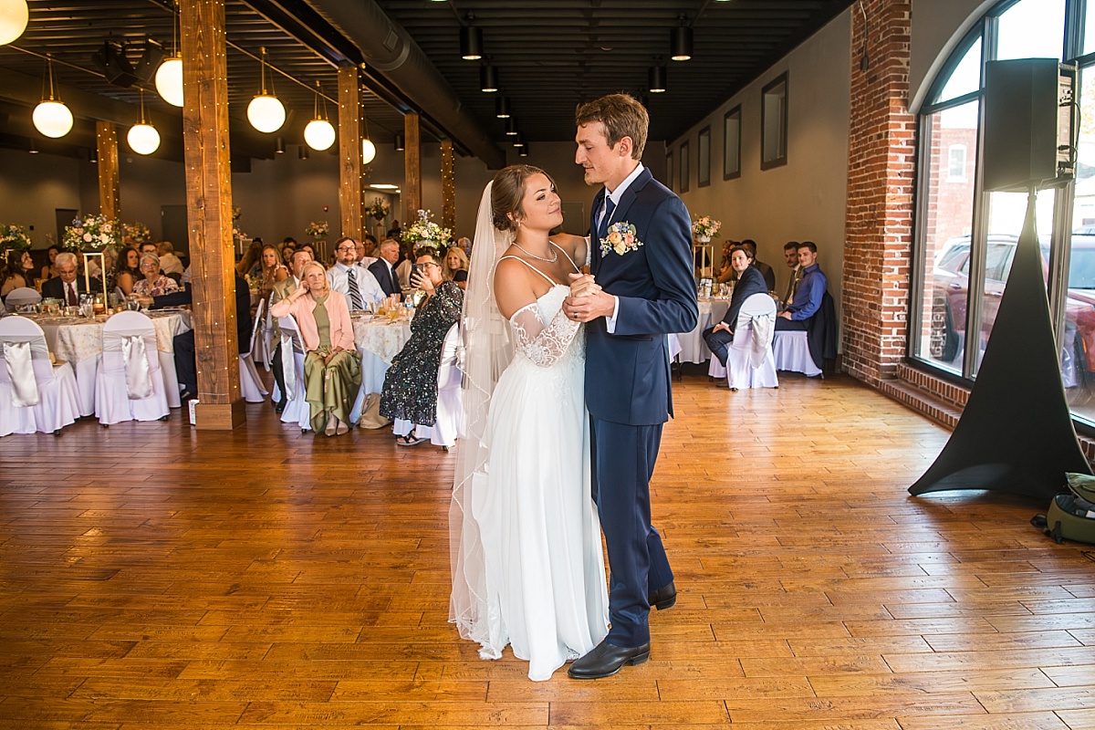 Grace and Alex share their first dance at their DuBourg Centre wedding reception