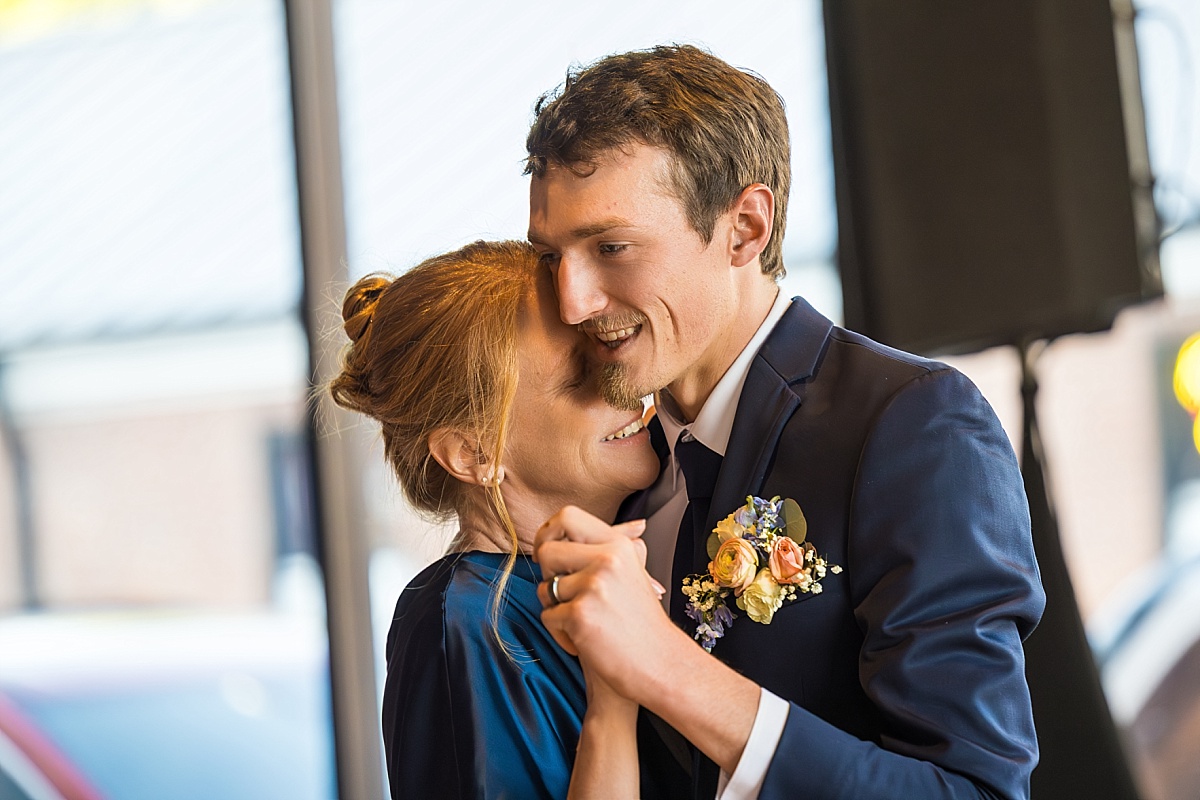 Alex dances with his mother during the wedding reception
