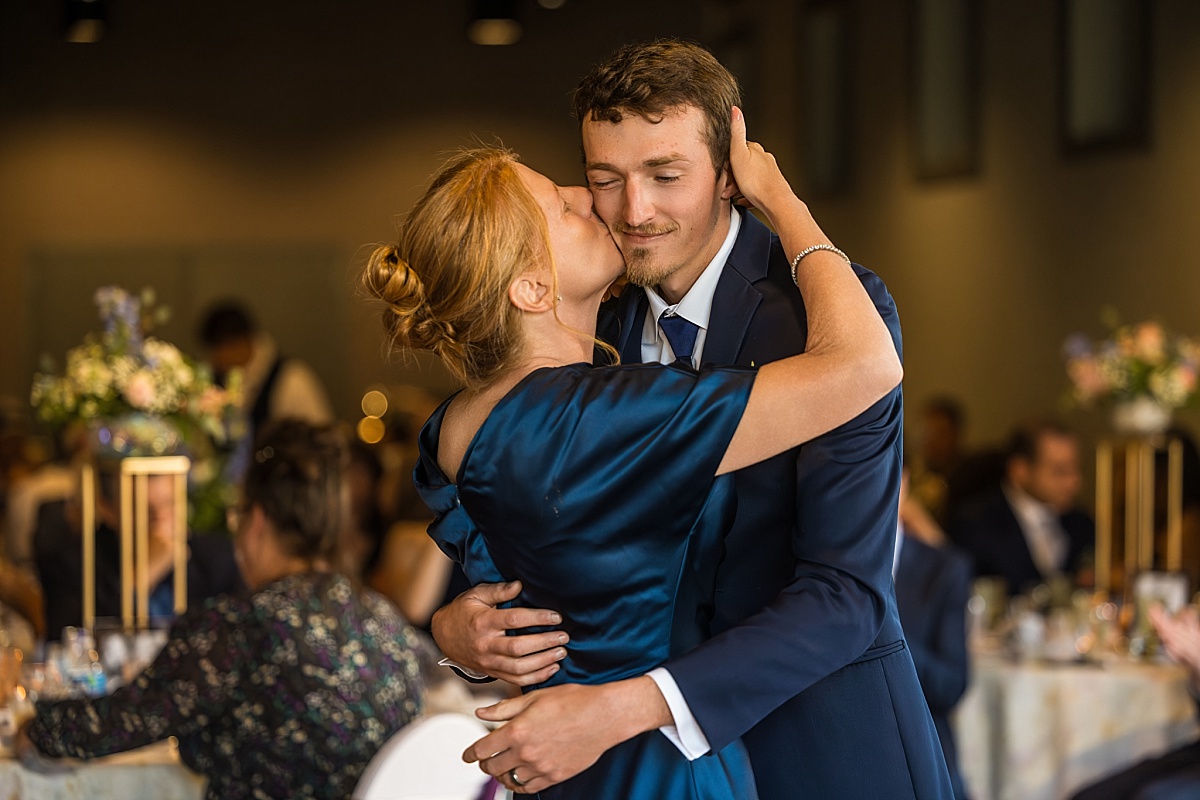 Alex dances with his mother during the wedding reception