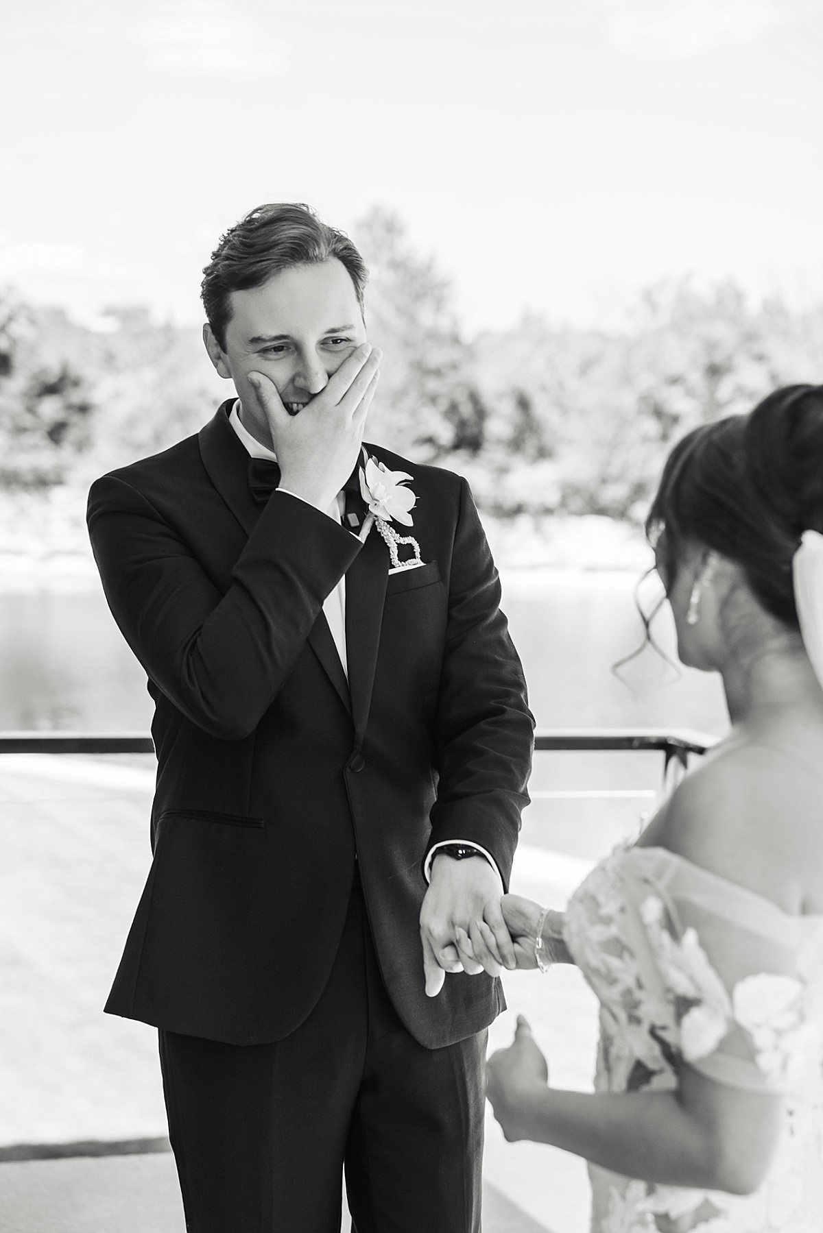 Justin becomes emotional as he holds Melicia's hand and sees her in her wedding dress.